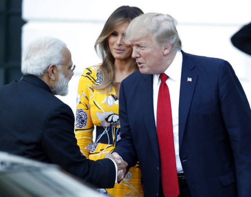 Prime Minister Narendra Modi shakes hands with President Donald Trump, as first lady Melania Trump looks on as Modi departs the White House. (Photo: AP)