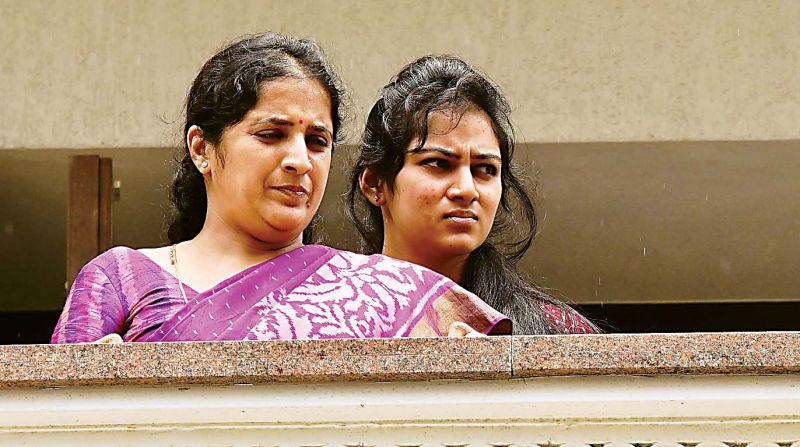 Usha, wife of Mr Shivakumar and their daughter at their residence.