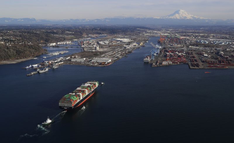 In this March 5, 2019 photo, a cargo ship arrives at the Port of Tacoma, in Tacoma, Wash. U.S. and Chinese negotiators resumed trade talks Friday, May 10, 2019, under increasing pressure after President Donald Trump raised tariffs on $200 billion in Chinese goods and Beijing promised to retaliate. (AP Photo/Ted S. Warren) 