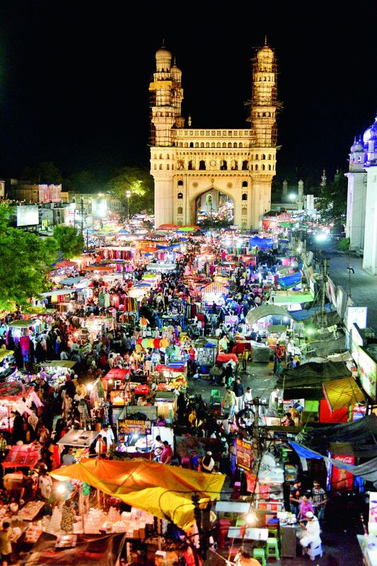 The bustling night market at Charminar.