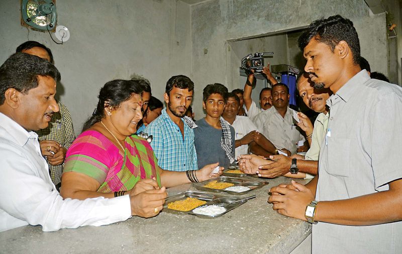 Mayor G Padmavathi and Deputy Mayor Anand inspects the food at Indira canteen at Vasanth Nagar, in Bengaluru on Friday. (Photo: DC)