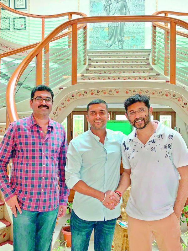 Writers Gopi Mohan (left) and B.V.S. Ravi (right) met actor Suriya at Mohan Babuâ€™s house on Monday