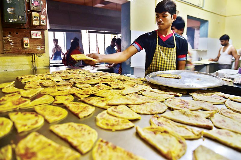 Holige being prepared at Chapati Mane, at Nandini Layout for Ugadi in Bengaluru on Tuesday. (Photo: DC)