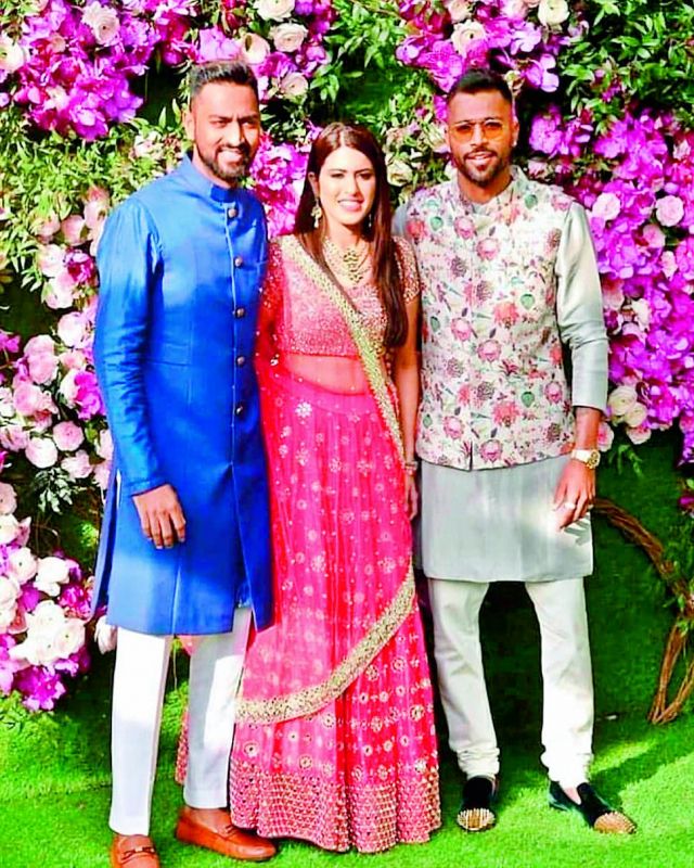 Cricketer Hardik Pandya shared some photos from the Ambani wedding and tagged the designer whose outfit he wore for the event.