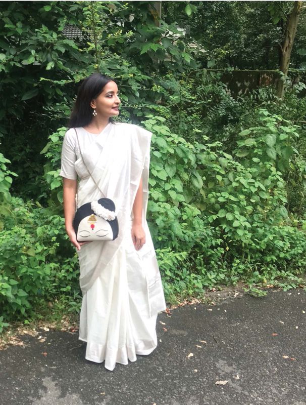 Ela India silver kasavu saree with Subr Studioâ€™s Mohini bag