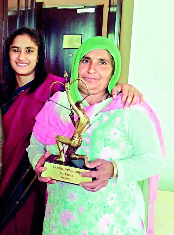 Vinesh with her mother.