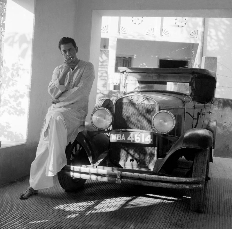 Satyajit Ray with the vintage 1930 Chrysler used in Abhijan,  Calcutta, 1963-64. Photo shoot for Filmfare, January 25, 1965 (Photo: Jitendra Arya/  Jitendra Arya Foundation)