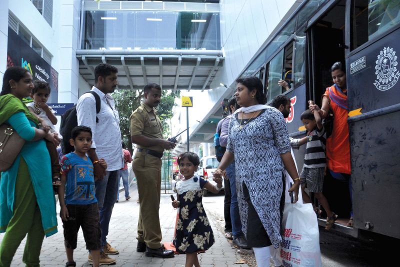 Cops help Kochi Metro passengers by dropping and picking them from metro stations on Sunday as public transports stayed away from roads following a BJP state hartal.