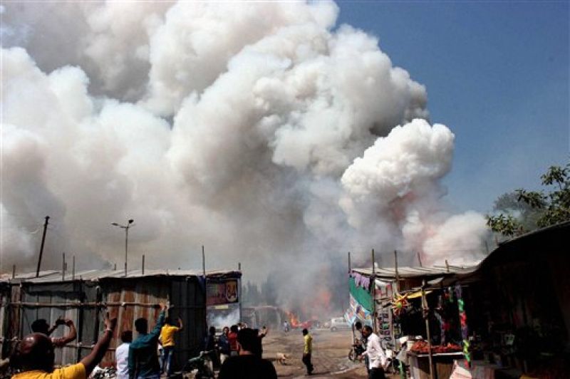 Smoke engulfs the fire cracker market. (Photo: PTI)
