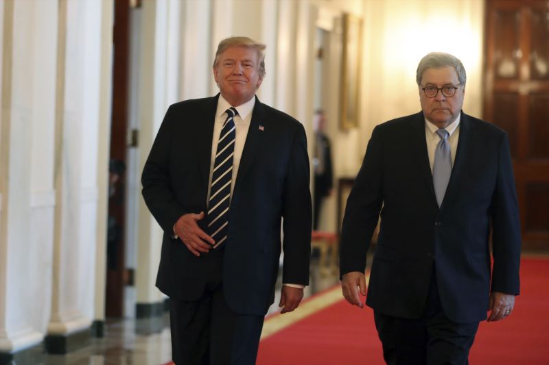 President Donald Trump and Attorney General William Barr arrive for a Public Safety Officer Medal of Valor presentation ceremony in the East Room of the White House, Wednesday, May 22, 2019, in Washington. (AP Photo/Andrew Harnik) 