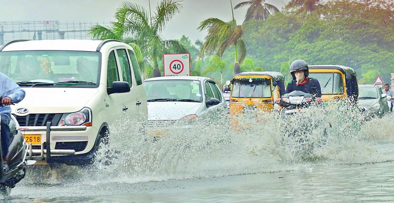 Thursday evening's sudden downpour saw waterlogging at Tank Bund. The government had issued a red alert for citizens not to venture out for three days as temperatures were expected to touch between 45Â°C and 48.5Â°C.  (Photo: P. Anil Kumar)