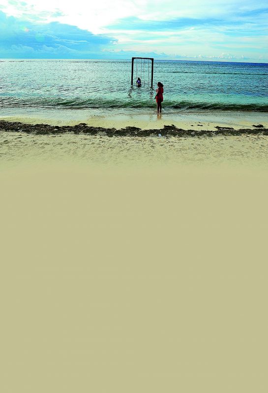 Catch the sunset from a swing in Gili Trawangan.