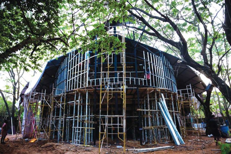 Biennale Pavilion made of debris and discarded material 