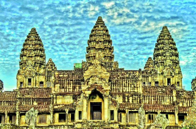 Angkor Wat in Cambodia. Photographed by James Wheeler; (right) Besakih in Bali. Photographed by Anna and Michal (Photo credit: Flickr)