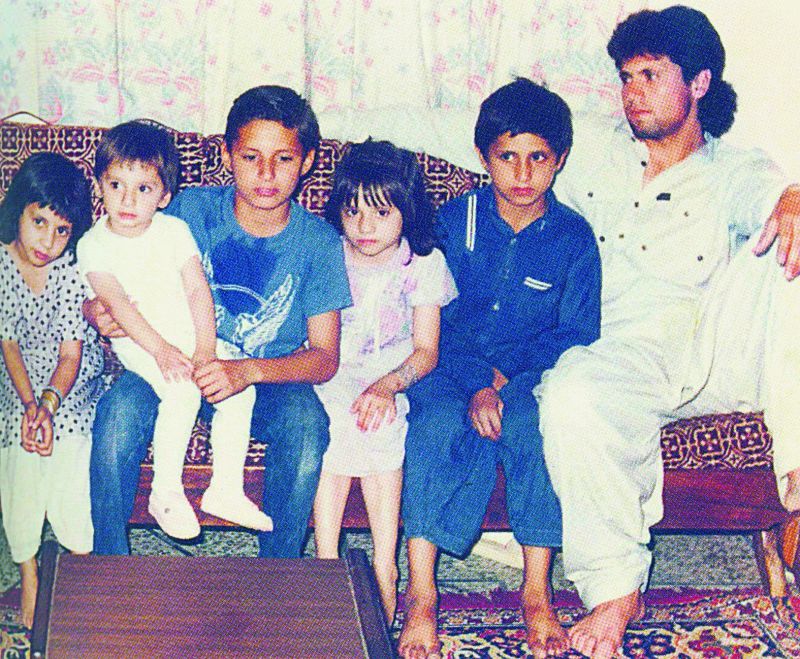 Afridi (fourth from the right) with his siblings 