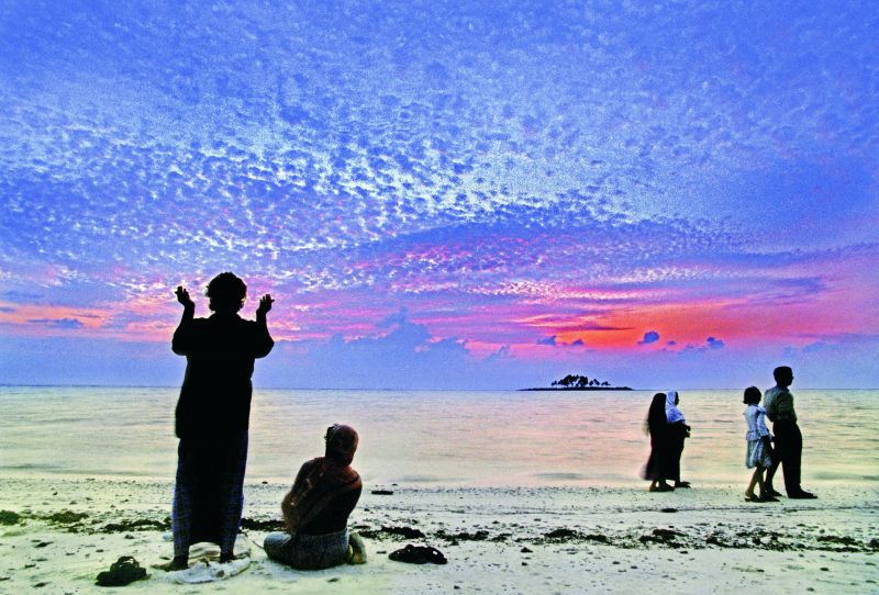A man offering namaz on the beaches of Minicoy island in Lakshadweep (Photographed in 1999 on film).