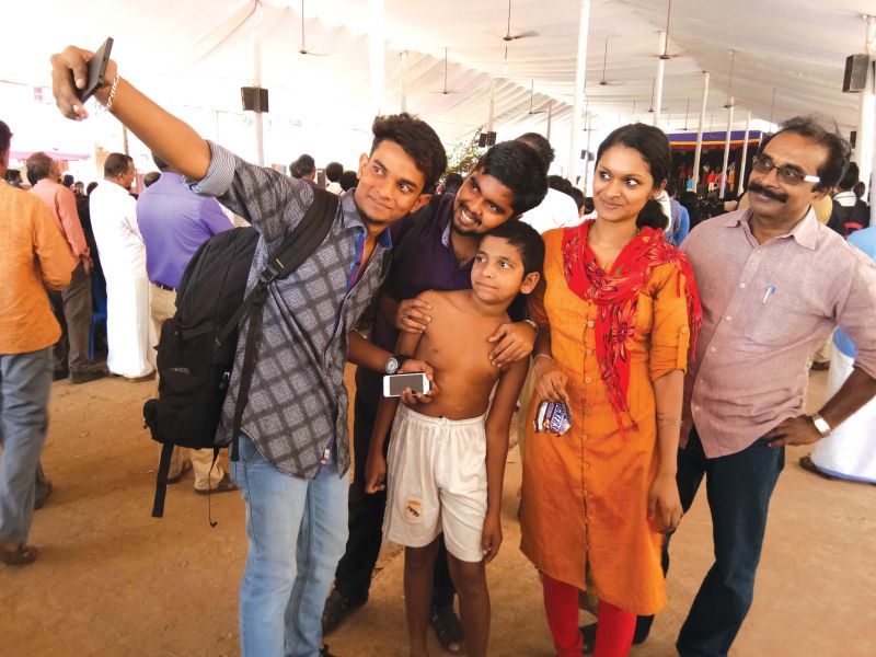 Ajmal (in shorts) takes selfie with his fans after his performance. (Photo:DC)