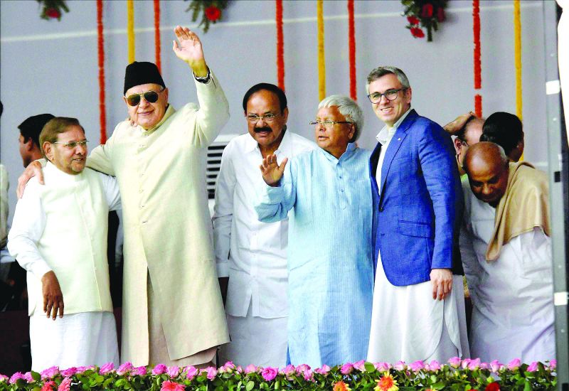 Union minister M. Venkaiah Naidu with RJD chief Lalu Yadav and former J&K CM Omar Abdullah 