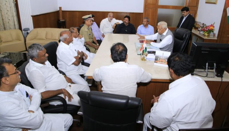 Photo: Rebel Cong-JDS MLAs met Governor Vajubhai Vala at his office in Bengaluru. (Photo: ANI)