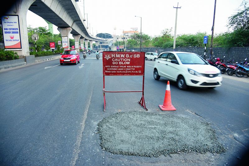 Civic officials were swift in sealing a pothole that took the life of a motorist at Habsiguda on Tuesday. (Image: Gandhi)