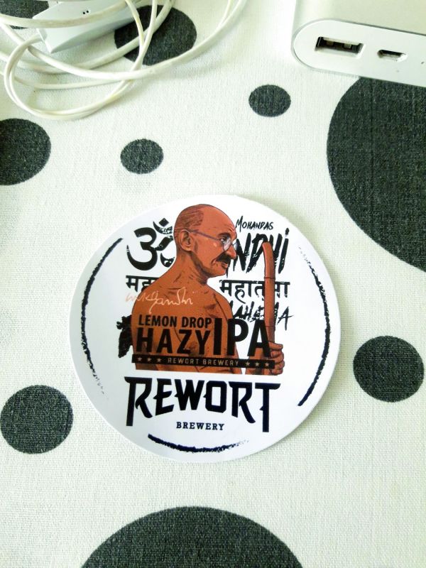 A sticker of Rewort Brewery has Gandhiji's photo on a sticker.