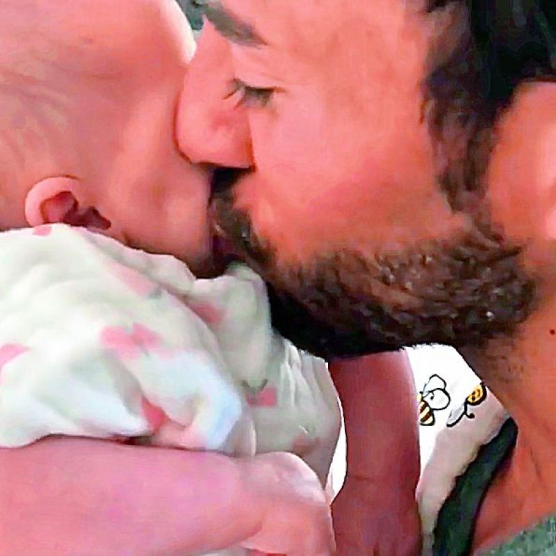 Enrique Iglesias pampered his infant daughter Lucy with several kisses in an adorable video he shared on Instagram on Sunday.