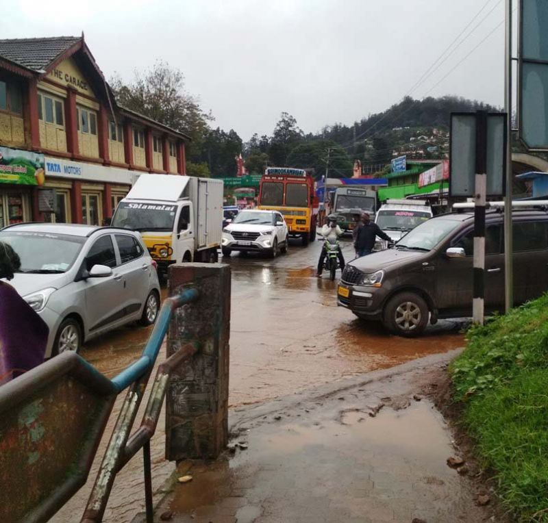 Water stagnates in Charring Cross bus stop area in Ooty.  (Image: DC)