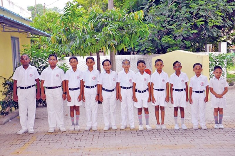 Students in their school uniform.