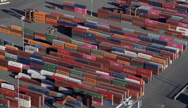 Cargo containers are staged near cranes at the Port of Tacoma, in Tacoma, Wash. The 25% tariffs President Donald Trump has imposed on thousands of Chinese-made products have business owners trying to determine how or whether they can limit the damage to profits from the import duties. (AP Photo/Ted S. Warren, File) 