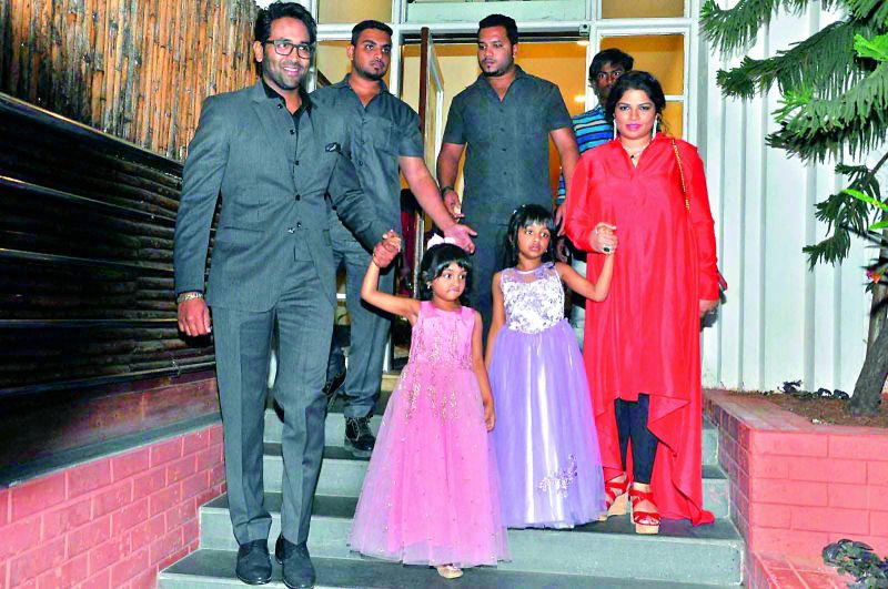  Manchu Vishnu and his wife Viranica with their daughters and two bouncers