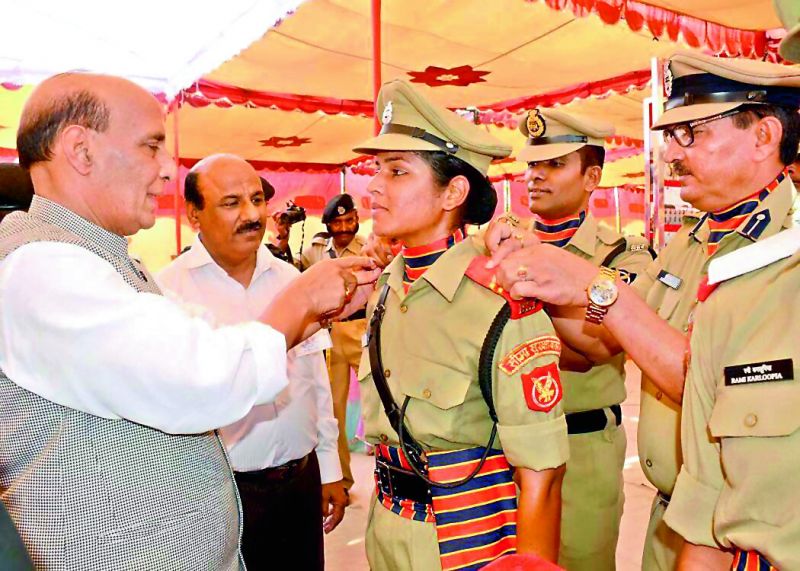 Tanushree is felicitated at the convocation ceremony at the BSF Academy at Tekanpur by Home Minister Rajnath Singh who put the rank stars on her shoulder