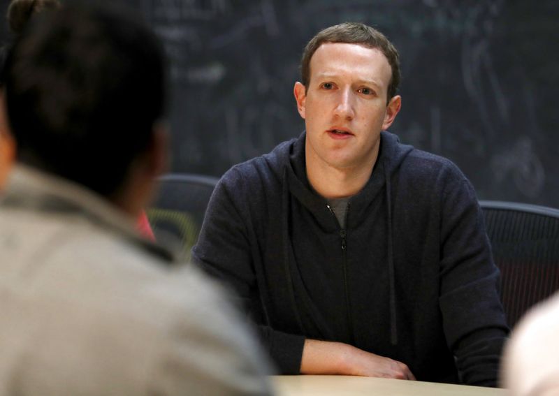 FILE- In this Nov. 9, 2017, file photo, Facebook CEO Mark Zuckerberg meets with a group of entrepreneurs and innovators during a round-table discussion at Cortex Innovation Community technology hub in St. Louis. With Zuckerberg,  its experiment, learn, experiment, learn,  said LinkedIn co-founder Reid Hoffman, who has known him since 2004. Hoffman said that is evident in Zuckerberg's enthusiasm for software, which can be overwritten to fix problems. (AP Photo/Jeff Roberson, File)