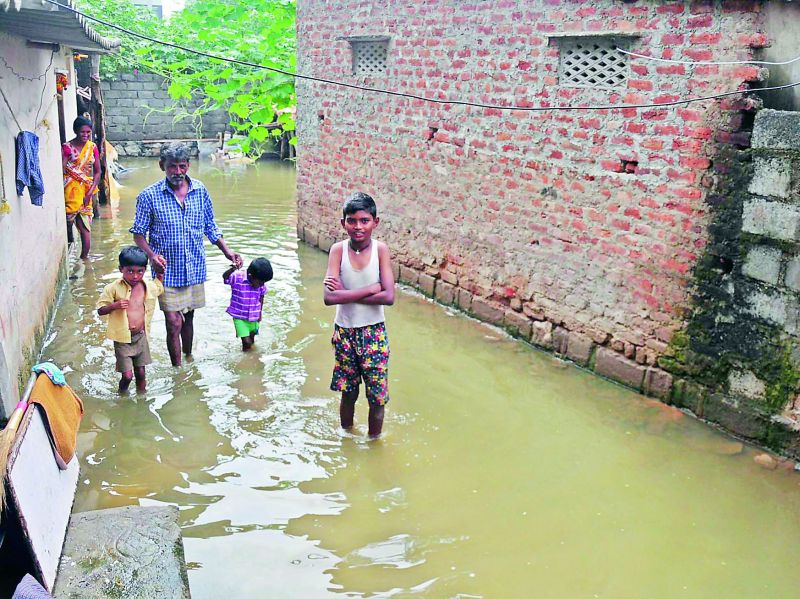 As Bowenpally lake overflowed, water entered the houses in the nearby area on Sunday. 	(Photo: DC)