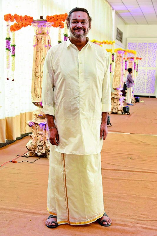 Designer Shravan Kumar looks  festive in a panche and a kurta