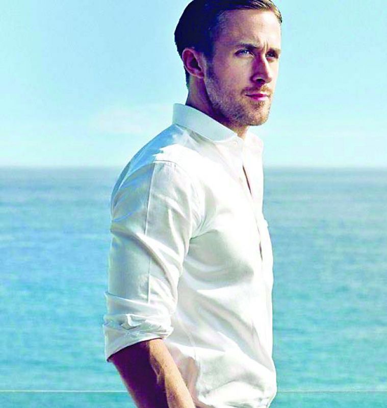 Ryan Gosling in a plain white shirt.
