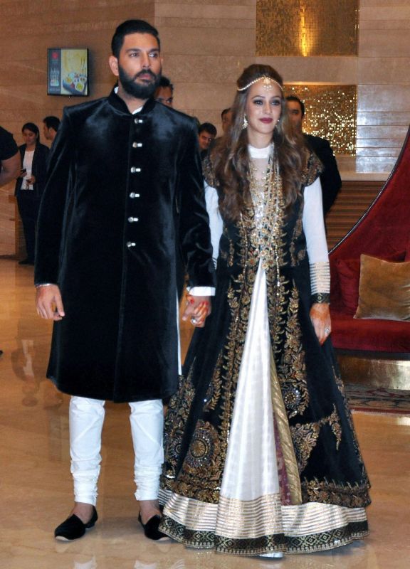 Yuvraj Singh and Hazel Keech could not hide their joy as they exchanged rings. (Photo: PTI)