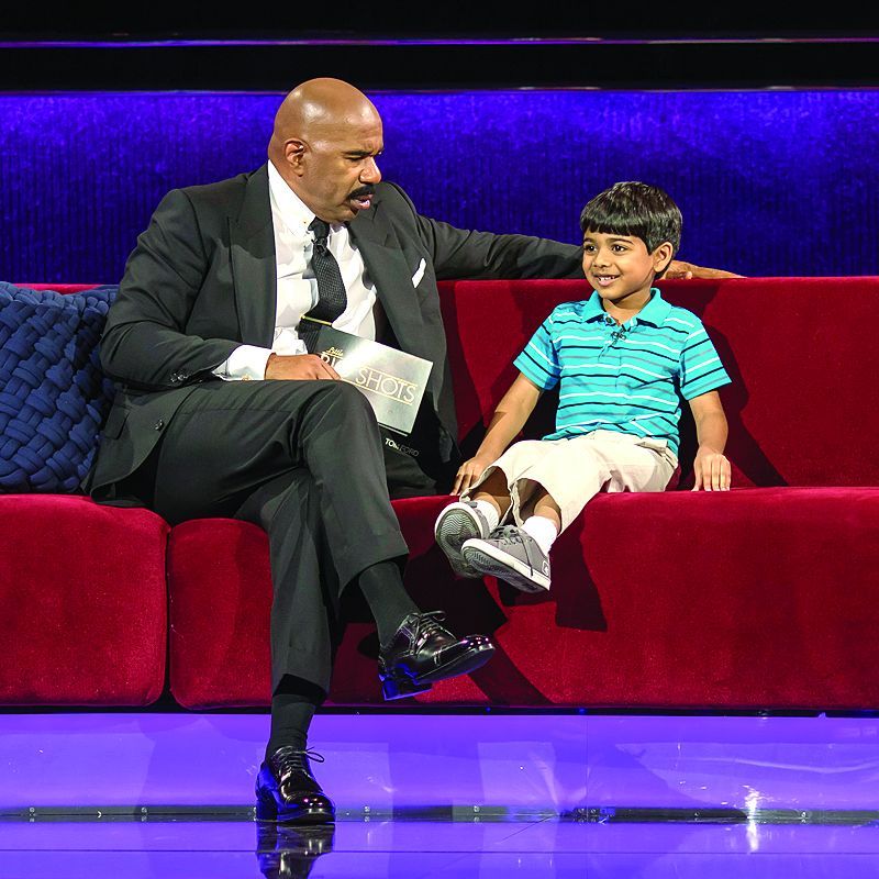 Akash with Steve Harvey on the sets of the hit TV show Little Big Shots.