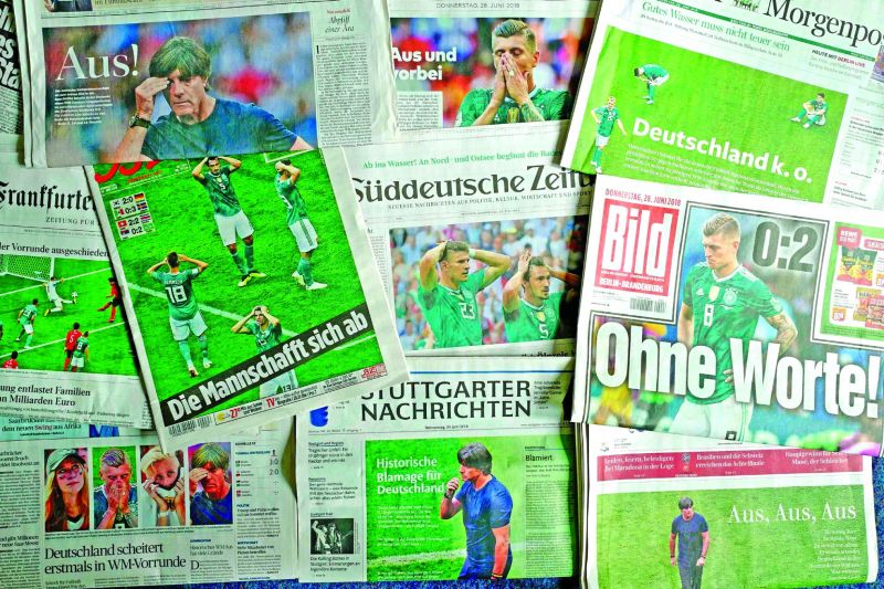 Front pages of German newspapers ripped through their national team after their exit from the World Cup in Russia. (Photo: AFP)