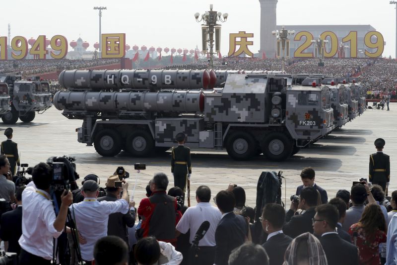 Military vehicles roll down during a parade to commemorate the 70th anniversary of the founding of Communist China in Beijing. (Photo: AP)