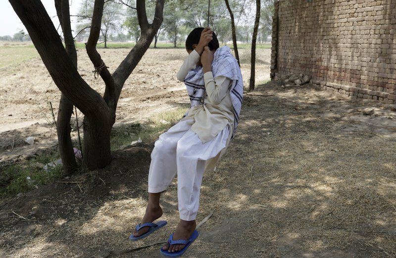 A Pakistani boy who was allegedly raped by a mullah or religious cleric, sits on a swing in Kehror Pakka, Pakistan on May 4. (Photo: AP)
