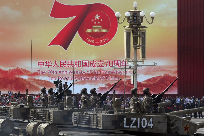 Army vehicles roll down during a parade to commemorate the 70th anniversary of the founding of Communist China in Beijing. (Photo: AP)