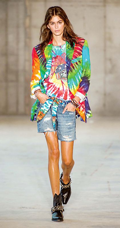 This model has paired her tie and dye top with shorts