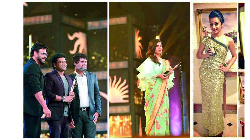 And the award goes to... Devi Sri Prasad and Samantha pose with their awards that they received on Wednesday at the IIFA; Trisha poses with an award that she won at SIIMA earlier