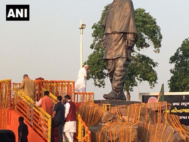 Prime Minister Narendra Modi pays tribute to Sardar Vallabhbhai Patel's statue near the Ahmedabad Airport.  (ANI twitter)