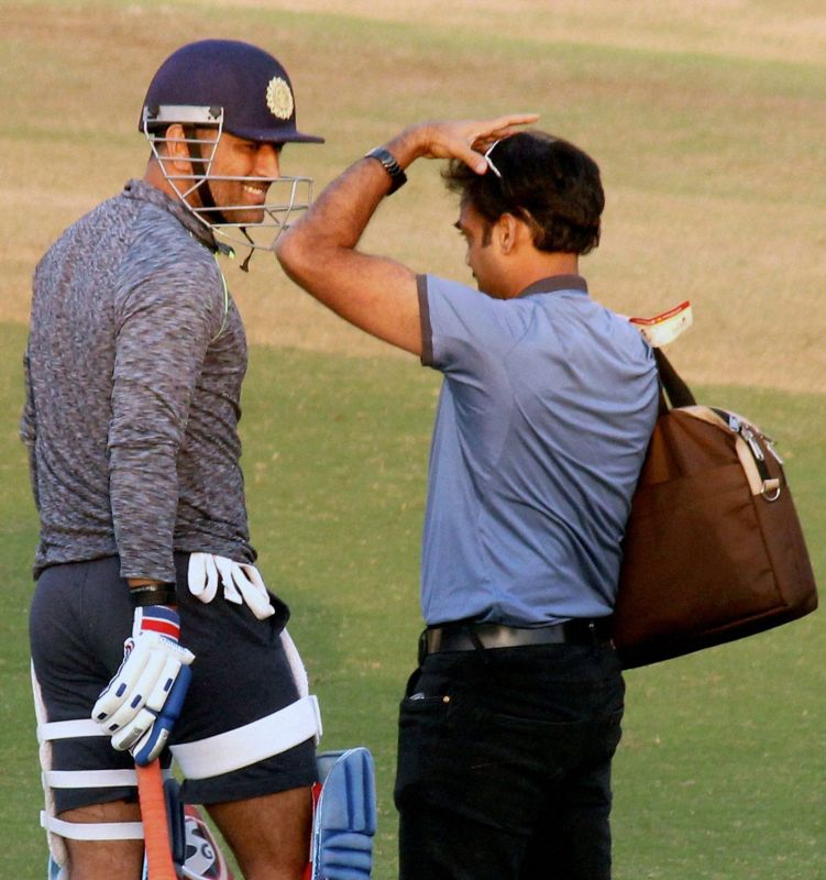 MS Dhoni and MSK Prasad, Team India chief selector, were seen having a chat on the sidelines of Gujarat versus Jharkhand Ranji Trophy semifinal in Nagpur. (Photo: PTI)