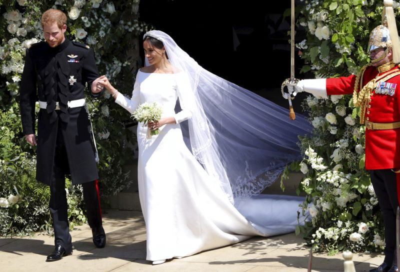 Prince Harry and Meghan Markle leave St George's Chapel after their wedding ceremony, in Windsor Castle. (Photo: AP)