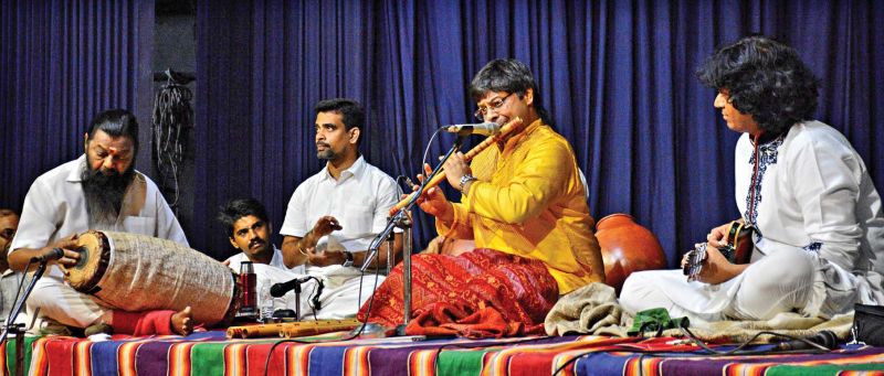 Shashank on flute, U. Rajesh on mandolin and veteran mridangist Karaikudi Mani impress the audience with their performance at the music festival organised by Karthik Fine Arts in the city on Monday.  (Photo: DC) 