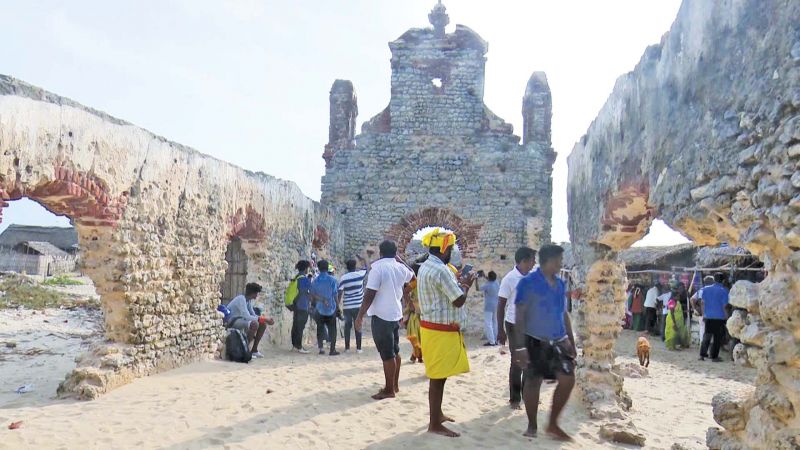 (Left) The over 100-year-old Church in DhaSmall shops have come up near the ruined building as tourists flow picks up.(Photo: DC)