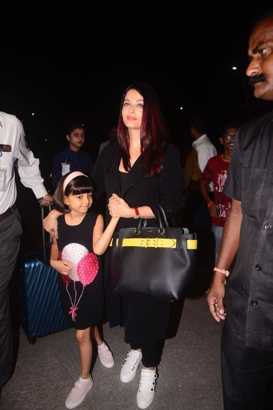 Aishwarya Rai Bachchcan leaves for festival with daughter Aaradhya.