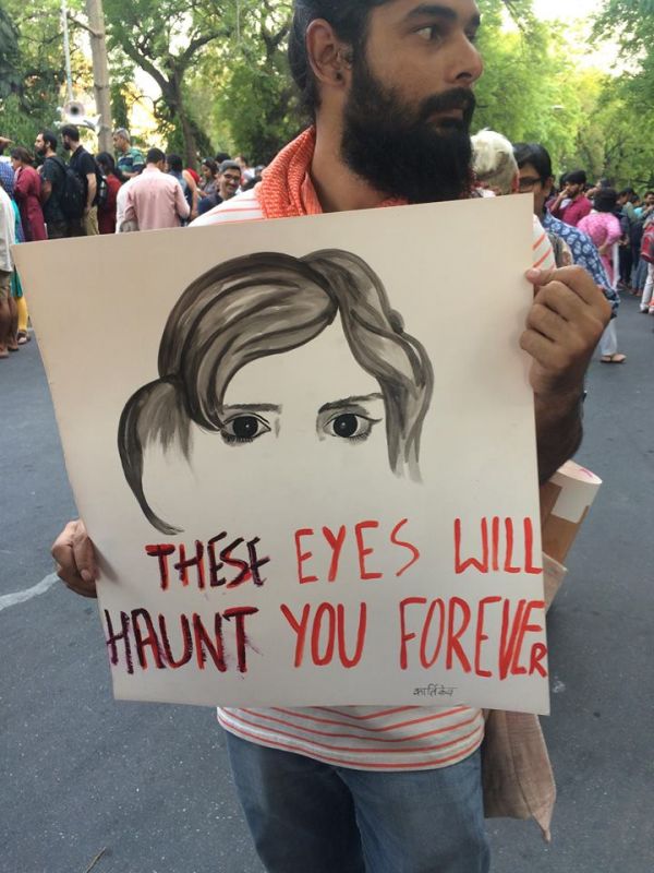 Protesters holding placards in Delhi. (Photo: Aditi Yajnik)